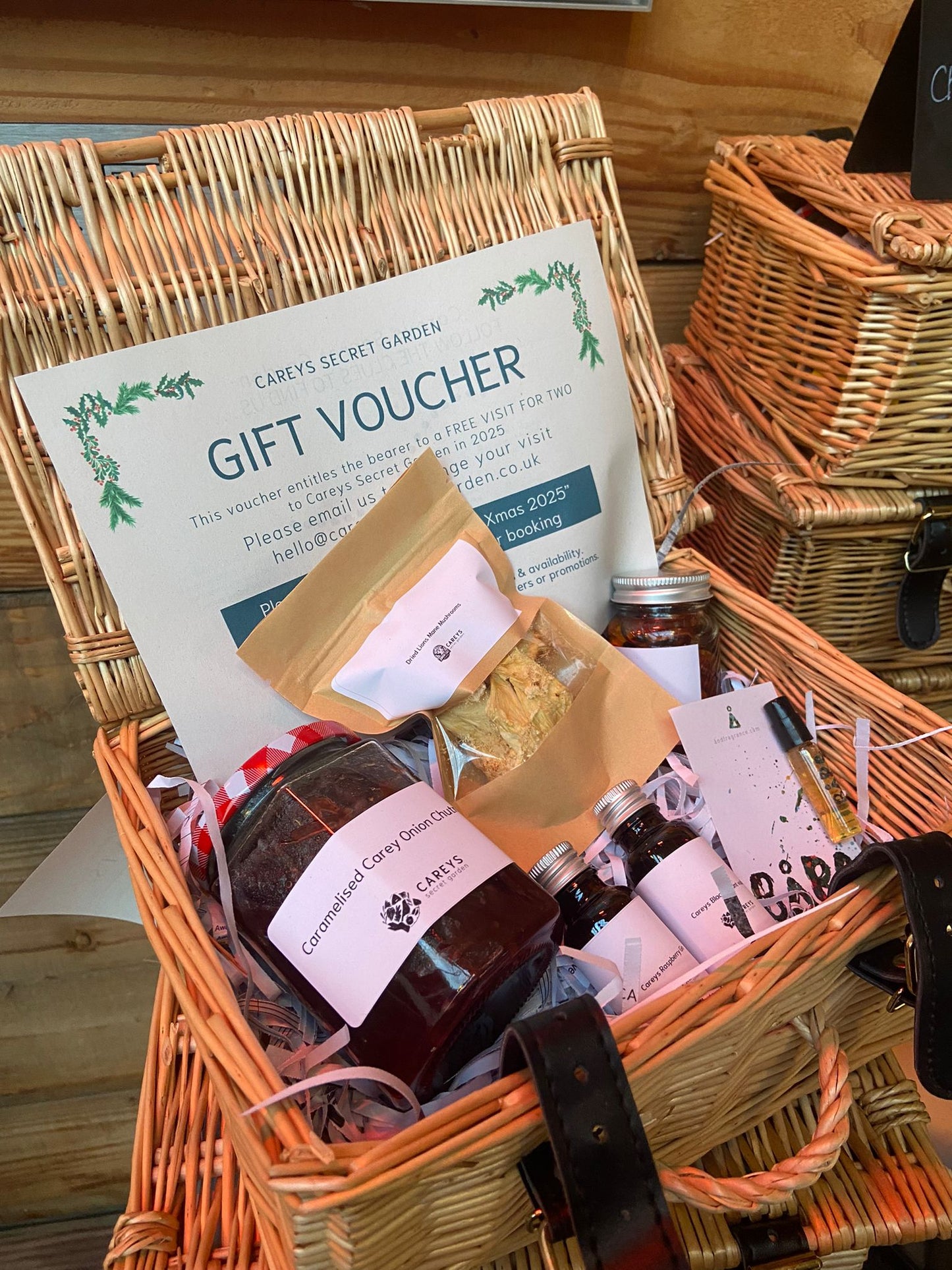 Carey’s gift hampers, featuring handmade treats, fragrance sample, and a voucher for two to visit the garden, offering a thoughtful and personalised gift experience.