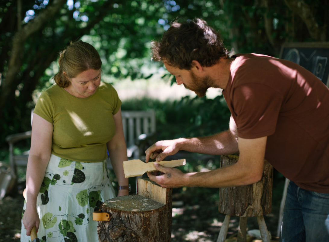 Woodworking workshop at Carey’s Secret Garden, with participants engaged in hands-on crafting, using tools to create unique wooden pieces in a creative and inspiring outdoor setting