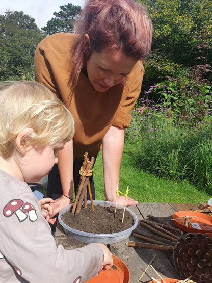 Weekly parent and toddler group at Carey’s, with parents and children engaging in nature-based activities, enjoying the outdoor space and fostering creativity and connection