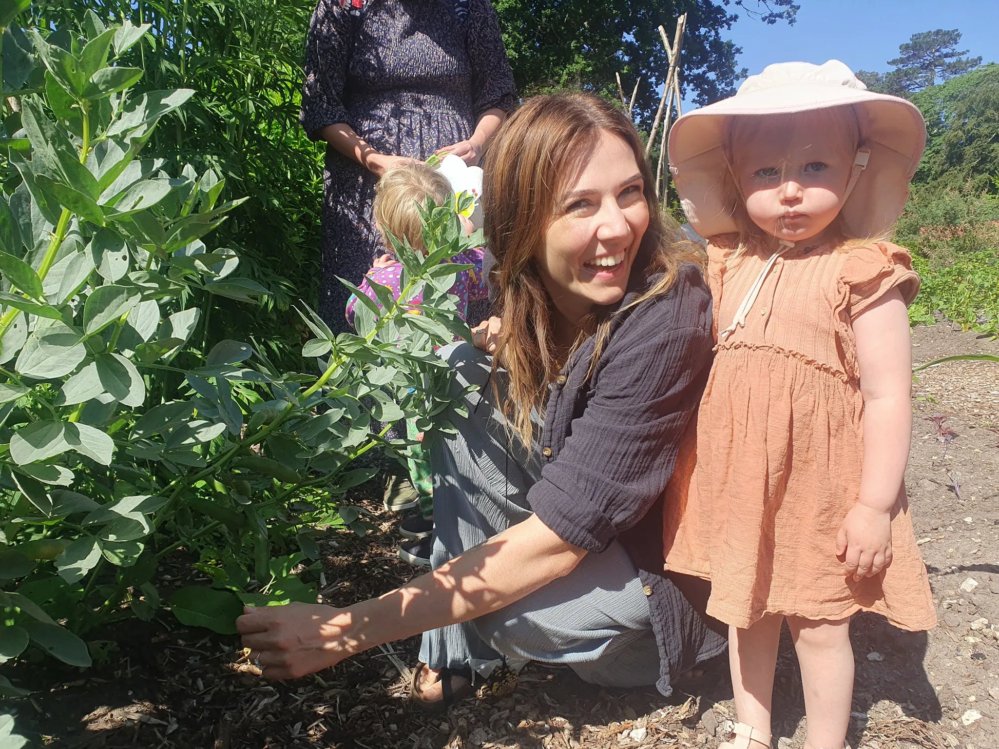 Weekly parent and toddler group at Carey’s, with parents and children engaging in nature-based activities, enjoying the outdoor space and fostering creativity and connection