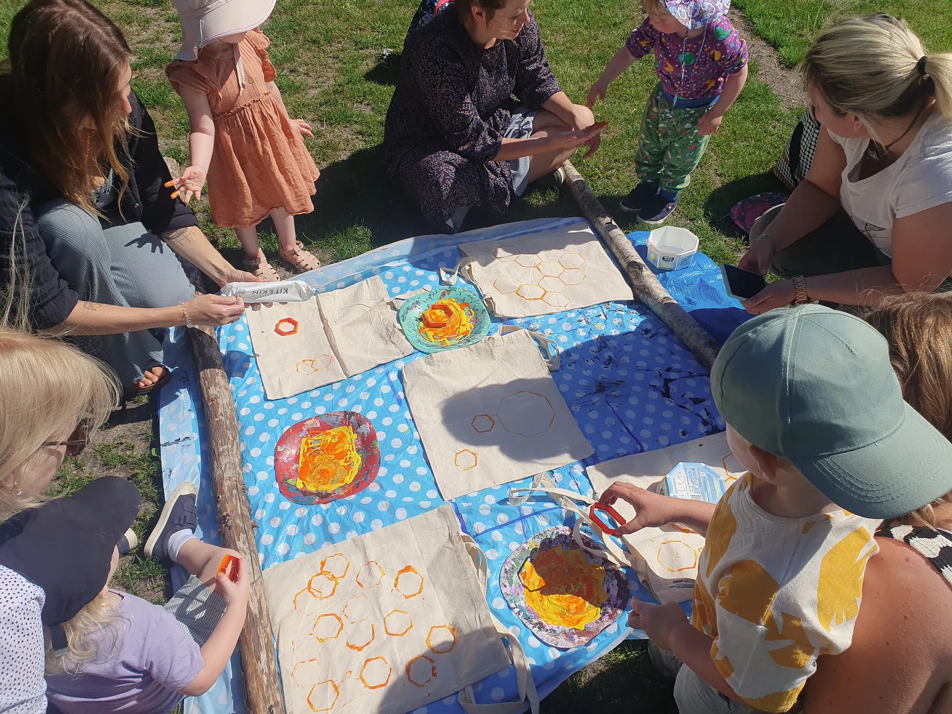 Weekly parent and toddler group at Carey’s, with parents and children engaging in nature-based activities, enjoying the outdoor space and fostering creativity and connection